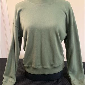 Super soft sweatshirt- can be worn with low back or front with a sports bra